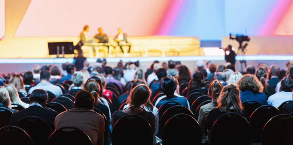 Vacation rental property managers attending a conference